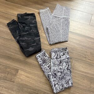 Athleta women’s Ultimate Camo, Salutation Stash II & Elation Graffiti 7/8 Tights